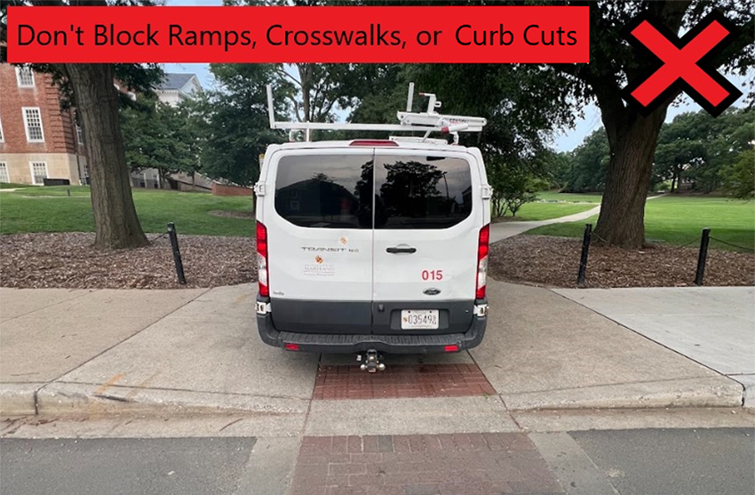 Improperly parked vehicle blocking curb cut