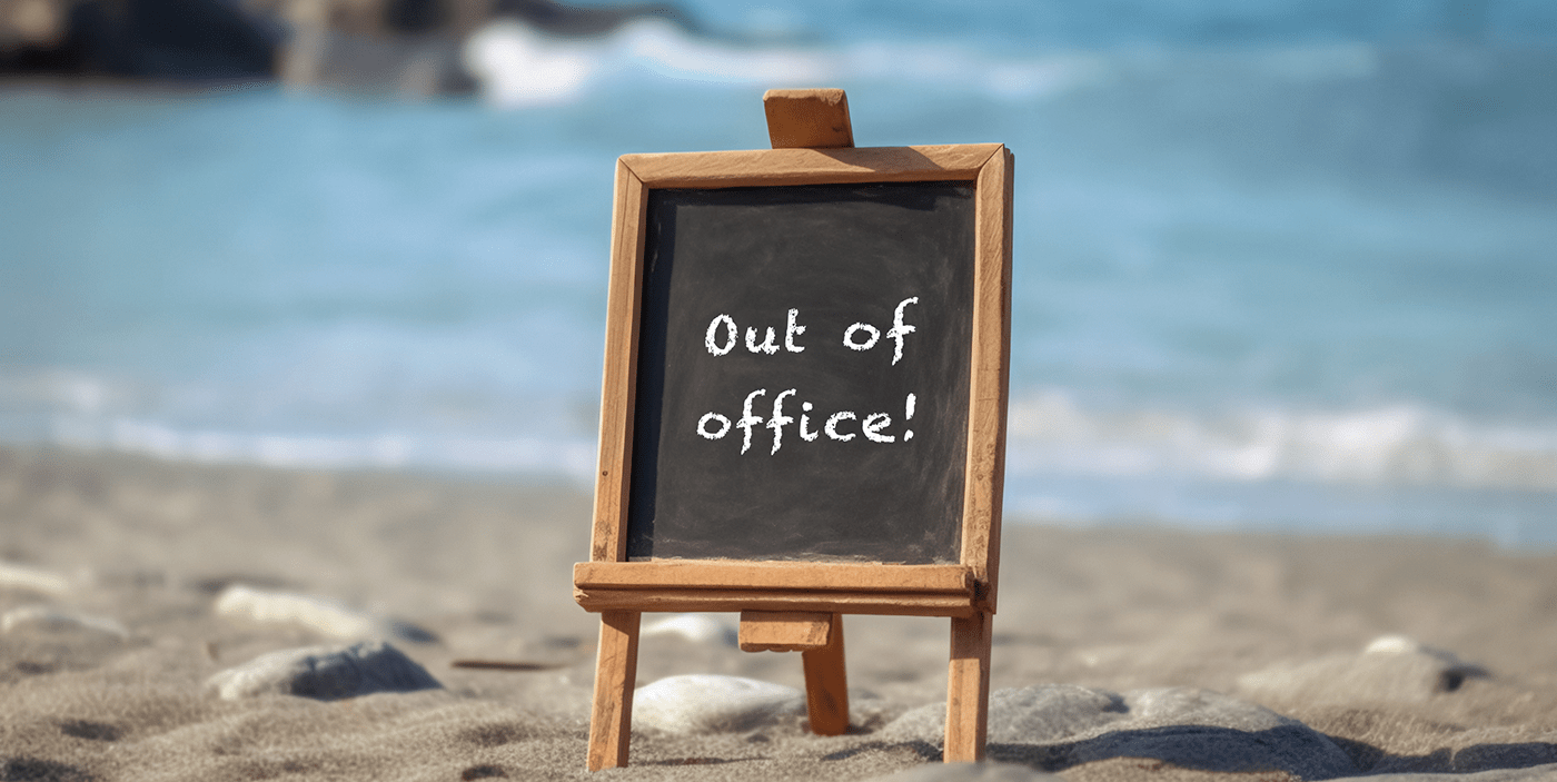Out of Office sign on beach